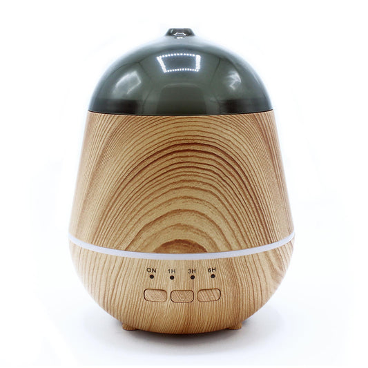 Wooden-textured diffuser with black top on a white background