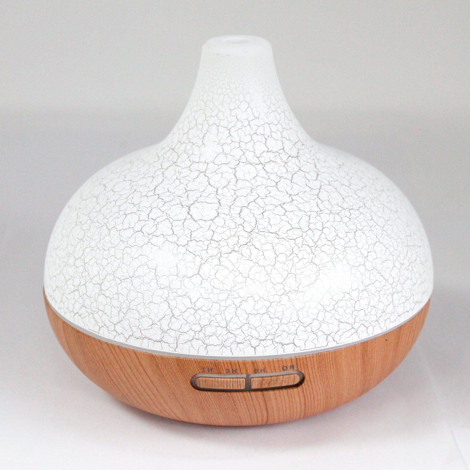 White cracked texture diffuser with wooden base 